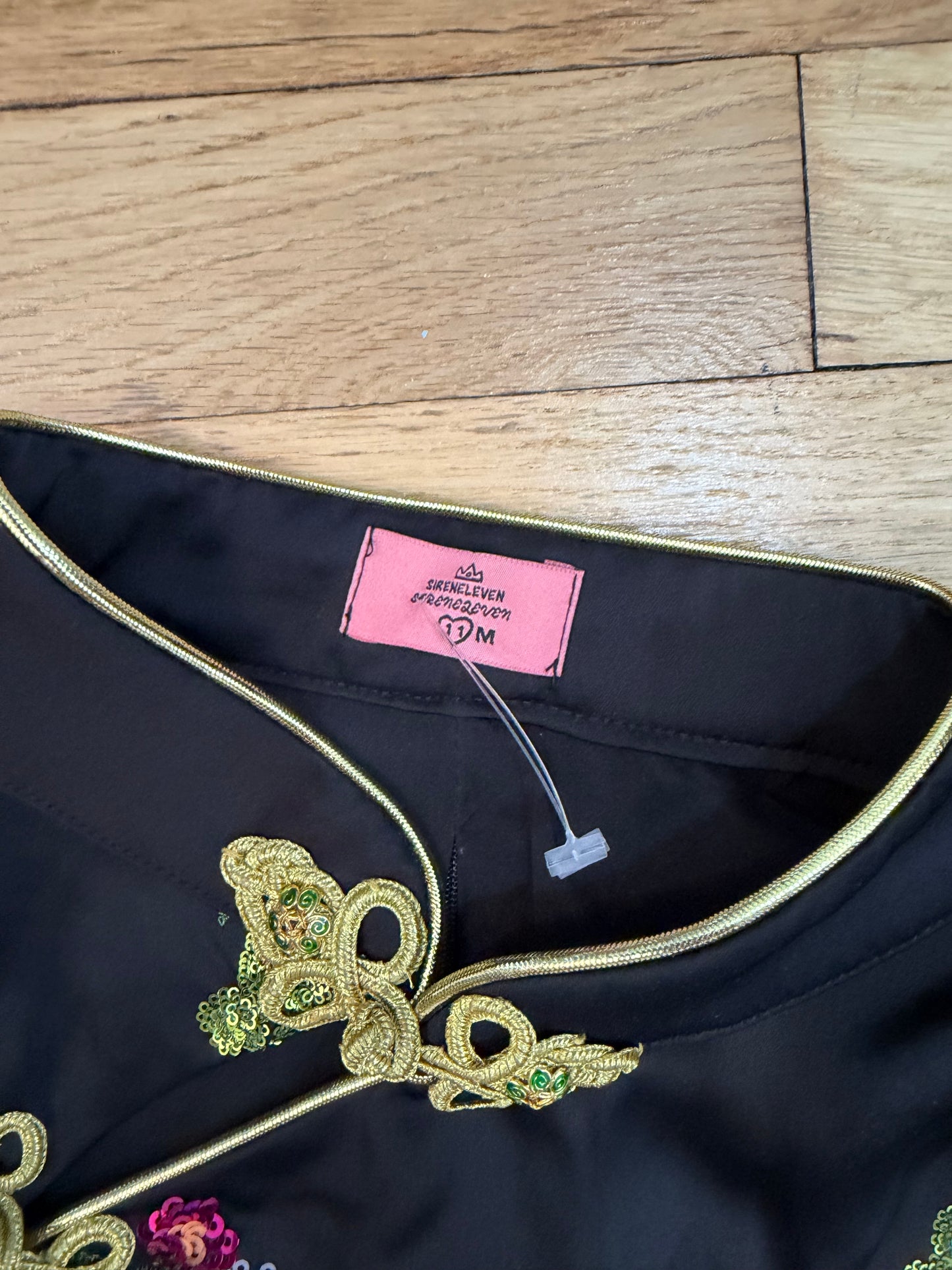 Black tang style top with floral details tuv #125678